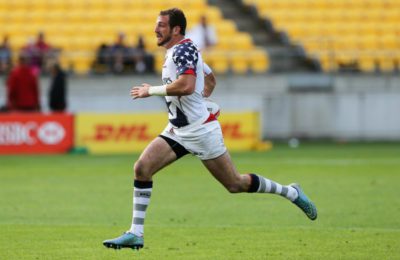 Zack Test of USA breaks away for a try during the 2016 Wellington Sevens pool match between France and USA. (Hagen Hopkins/Getty)