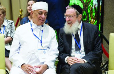 Rabbi Daniel Sperber with a Jain spiritual leader. (Hillel Maeir/TPS)