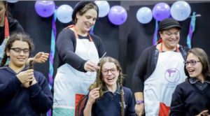 Students at Beth Rivkah Ladies College in Melbourne, Australia donating their hair to make wigs for Israeli children with cancer. (Chana Franck)