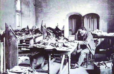 Solomon Schechter studying fragments from the Geniza. (University of Cambridge, permission of the Syndics of Cambridge University Library)