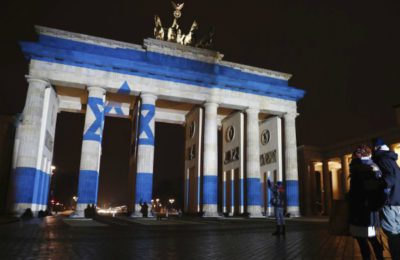 The Brandenburg Gate was lit up with the Israeli flag following a terrorist attack, Jan. 8, in Israel that killed four. (Odd Anderson/AFP/Getty)