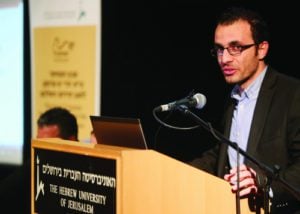 Sirwan Kajjo speaking at the event at Hebrew University in Jerusalem, Jan. 17. (Hillel Maeir/TPS)