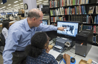 Students work on the History Unfolded project at the MLK library in Washington DC.
