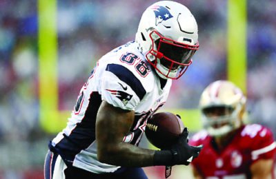 Patriot Martellus Bennett, shown here in a game against the San Francisco 49ers, is one of the players slated to visit Israel. (Ezra Shaw/Getty)
