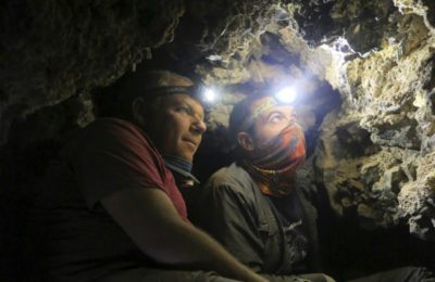 Excavators explore the interior of the newly discovered cave in Qumran. (Ashernet)