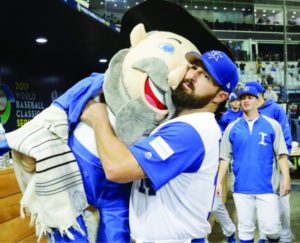 Infielder Cody Decker of Team Israel holds team mascot The Mensch on the Bensch in Seoul, South Korea. (Chung Sung-Jun/Getty)