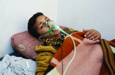 Chemical gas attack survivor nine-year-old boy, Hassan Dallal, at an hospital Maarrat al-Nu'man Town of Idlib, Syria, April 5, 2017. (Mohammed Karkas/Anadolu Agency/Getty)