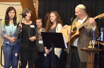 Rabbi Fred Greene, right, from l-r: daughter Yael, wife Deborah, and daughters Noa and Leora.