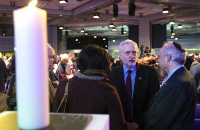 Jeremy Corbyn speaks with guests during a National Holocaust Memorial Day event in London, 2017. (Jack Taylor/Getty)
