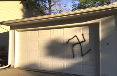 The swastika painted on the Wolfs' garage door in Aurora, Colorado.