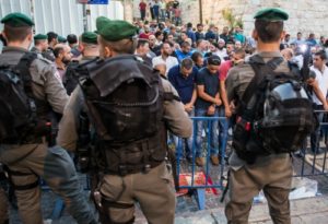 Palestinians protest outside the Temple Mount, July 19. (Kobi Richter/TPS)