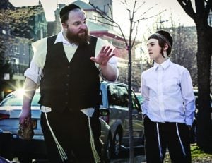 Menashe Lustig, left, and Ruben Niborski in the film 'Menashe.' (Federica Valabrega/A24)