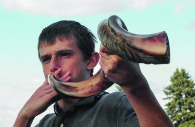 Zev Cohen, 17, was one of HEA's shofar blowers. (Neil Rosenfeld)
