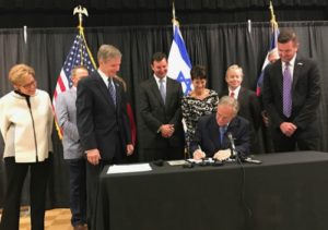 Texas Gov. Greg Abbott signing his state's anti-BDS bill at a Jewish community center in Austin, May 2, 2017.