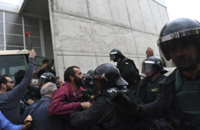 Police dispersing a crowd in Sant Julia de Ramis, Spain, Oct. 1. (David Ramos/Getty)