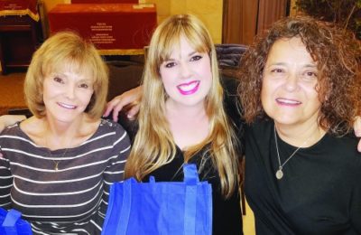 Sara Shvartzman, center, with Susan Anderson, left, and Sandra Evans at a KOTR event.