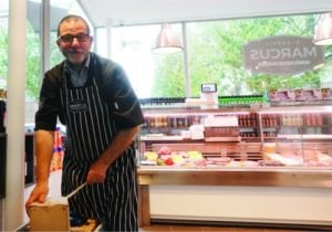 Nissim Guedj at his kosher meat shop in Amsterdam.