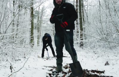 Jonny Daniels, foreground, and Robert Skrupa, a From the Depths volunteer, digging up fragments of Jewish headstones in eastern Poland, 2015.