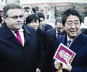 Japan's PM Shinzo Abe, right, with Lithuanian Foreign Minister Linas Linkevicius. (Petras Malukas/AFP/Getty)