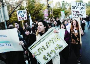 A protest in Tel Aviv against the deportation of African asylum seekers,  Jan. 24, 2018. (Tomer Neuberg/Flash90)