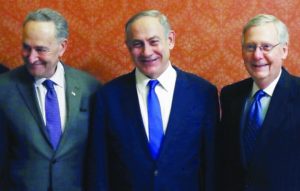 L-r: Chuck Schumer, Benjamin Netanyahu, Mitch McConnell pictured in 2017. (Mark Wilson/Getty Images)