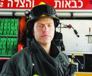 Firefighter Yaakov Guttman at the Tel Aviv-Jaffa fire station.