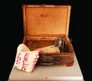 A small suitcase taken to the Budapest ghetto by a family named Horowitz, on display at Amud Aish.