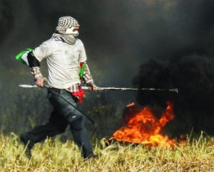 Palestinian protester at the Israel-Gaza border, April 2. (Said Khatib/AFP)