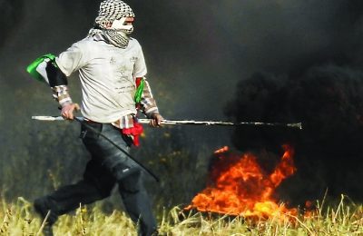 Palestinian protester at the Israel-Gaza border, April 2. (Said Khatib/AFP)