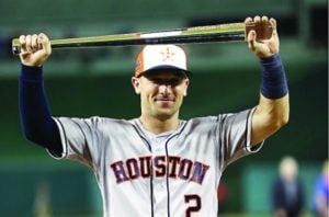 Alex Bregman posing with the MVP trophy, July 17, 2018. (Patrick Smith/Getty)