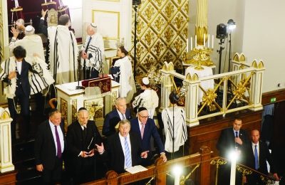 A Torah scroll that fleeing Jews hid 75 years ago at a church Is returned to the Great Synagogue of Copenhagen, Denmark, Oct. 11.
