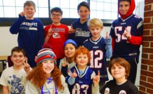 Students at the MetroWest Jewish Day School in Framingham, Mass., decked out in Patriots gear, Feb. 1, 2019.