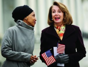 Rep. Ilhan Omar, l, with  Rep. Nancy Pelosi, March 8, 2019. (Chip Somodevilla/Getty)