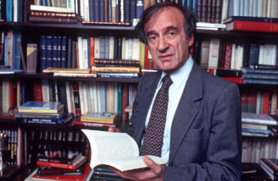 Elie Wiesel pictured in his office, from where much of the archive material was culled. (IJN file photo)