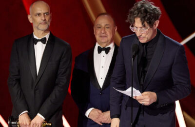 From left: James Wilson, Leonard Blavatnik and Jonathan Glazer accept the Oscar for Best International Feature Film, ‘The Zone of Interest,’ during the live ABC telecast of the 96th Oscars at the Dolly Theatre at Ovation Hollywood on March 10, 2024. (Academy of Motion Picture Arts & Sciences via JTA)