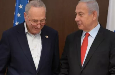 Sen. Chuck Schumer and PM Netanyahu in better times, meeting in Jerusalem Feb 23, 2021. (Amos Ben-Gershom/Israel GPO)