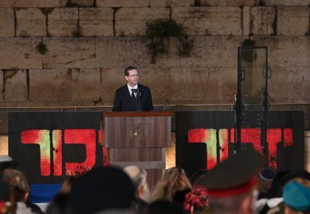 Israel President Isaac Herzog speaks at the annual Yom Hazikaron Memorial Ceremony for Israel’s fallen soldiers, May 12, at the Western Wall in Jerusalem. (Ma’ayan Toaf/GPO)