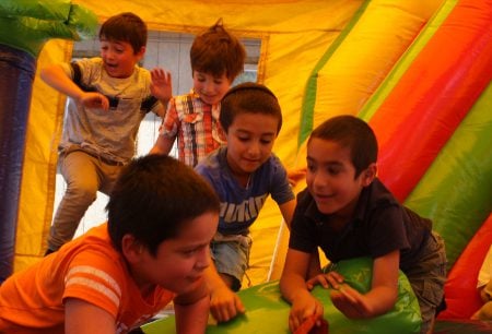 The bounce house is one of many fun activities at Camp Gan Israel in Denver. (Steve Mark)