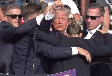 In a screen grab captured from a video, Republican presidential candidate and former President Donald Trump appears to be injured after gunshots were reported at a rally in Butler, Pennsylvania, July 13, 2024. (Anadolu/Getty Images)