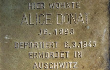 The Stolpersteine, or Stumbling Block, placed outside Anna Donat’s Berlin home shows when she was deported to Auschwitz.