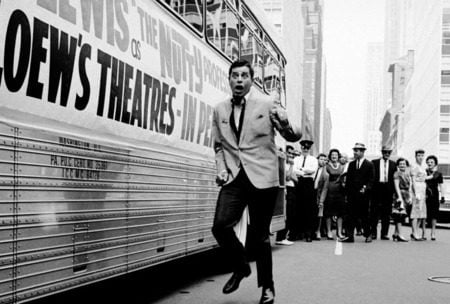 American comedian and actor Jerry Lewis pretends to run from adoring fans during the promotional tour for the film ‘The Nutty Professor,’ directed by and starring Lewis, in 1963. (Arthur Schatz/Getty Images)