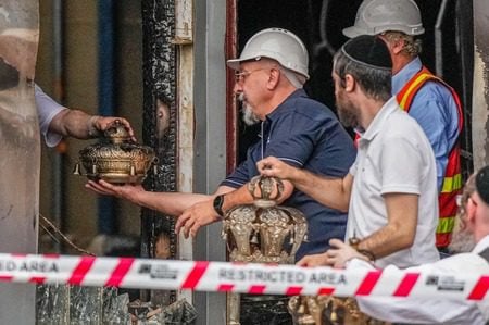 Congregants recover items from the Adass Israel Synagogue on Dec. 6, 2024, in Melbourne, Australia. (Asanka Ratnayake/Getty Images)