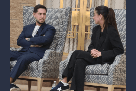 Former hostage Eliya Cohen and his fiancée, Ziv Aboud, who survived the Oct. 7, 2023 Nova music festival massacre, speak at the HEA in Denver, March 19, 2026.