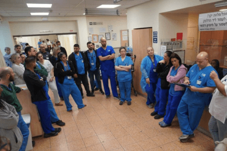 Doctors and nurses at Kaplan Medical Center in Rehovot gather in the hospital after the start of Operation Roaring Lion on March 1. (Kaplan Spokesperson)