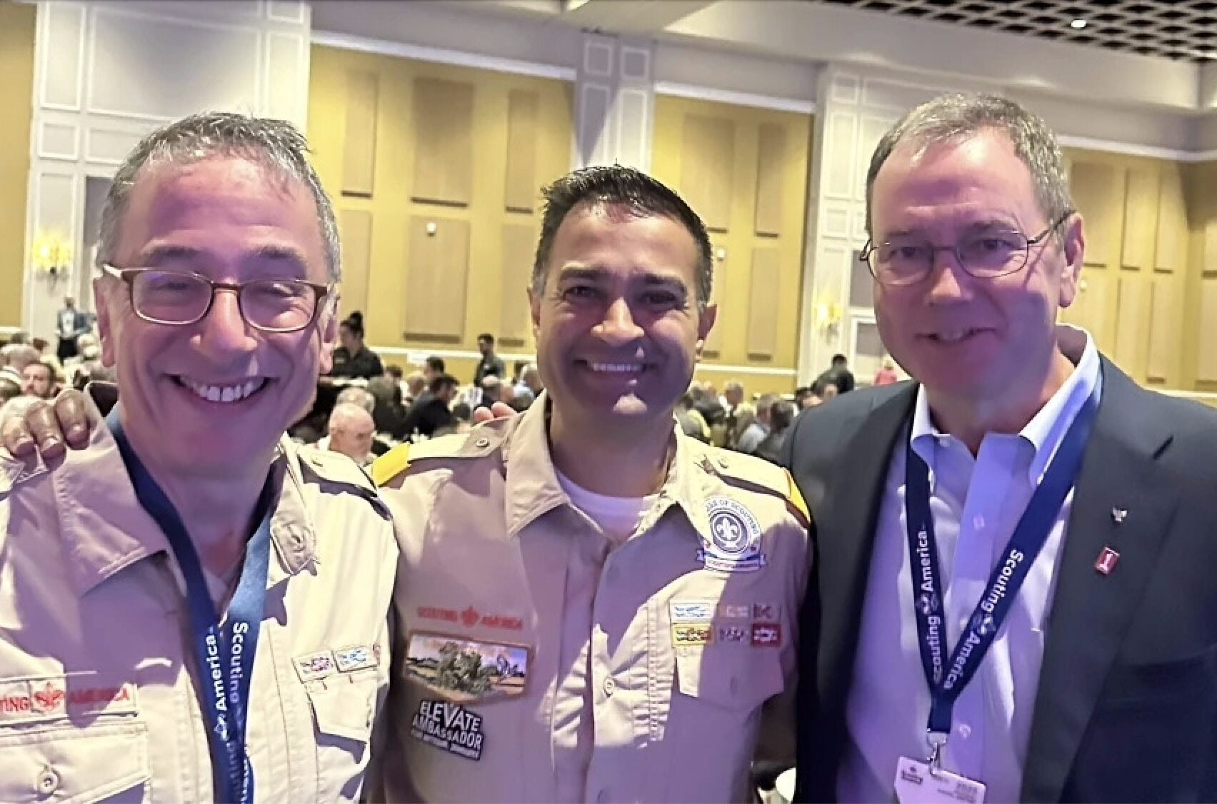 L-r: Ricky Mason, incoming natinal executive board chair of Scouting America; national commissioner Debang Desai; and outgoing chair Brad Tilden.