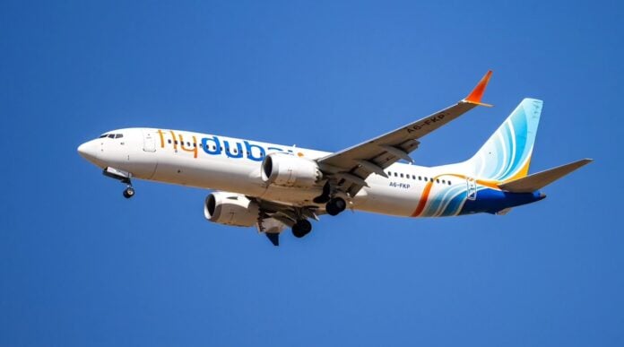 FlyDubai A flydubai passenger plane flies over Ben Gurion International Airport in Israel, Sept. 9, 2026. (Yossi Aloni/Flash90)